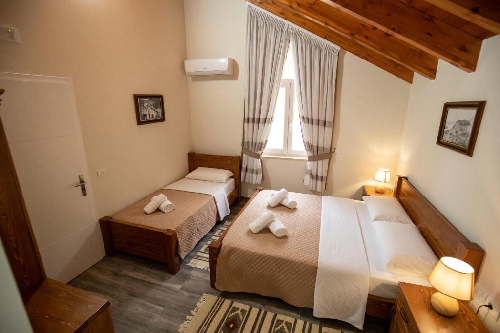 Postel nebo postele na pokoji v ubytování Xhuli Guesthouse