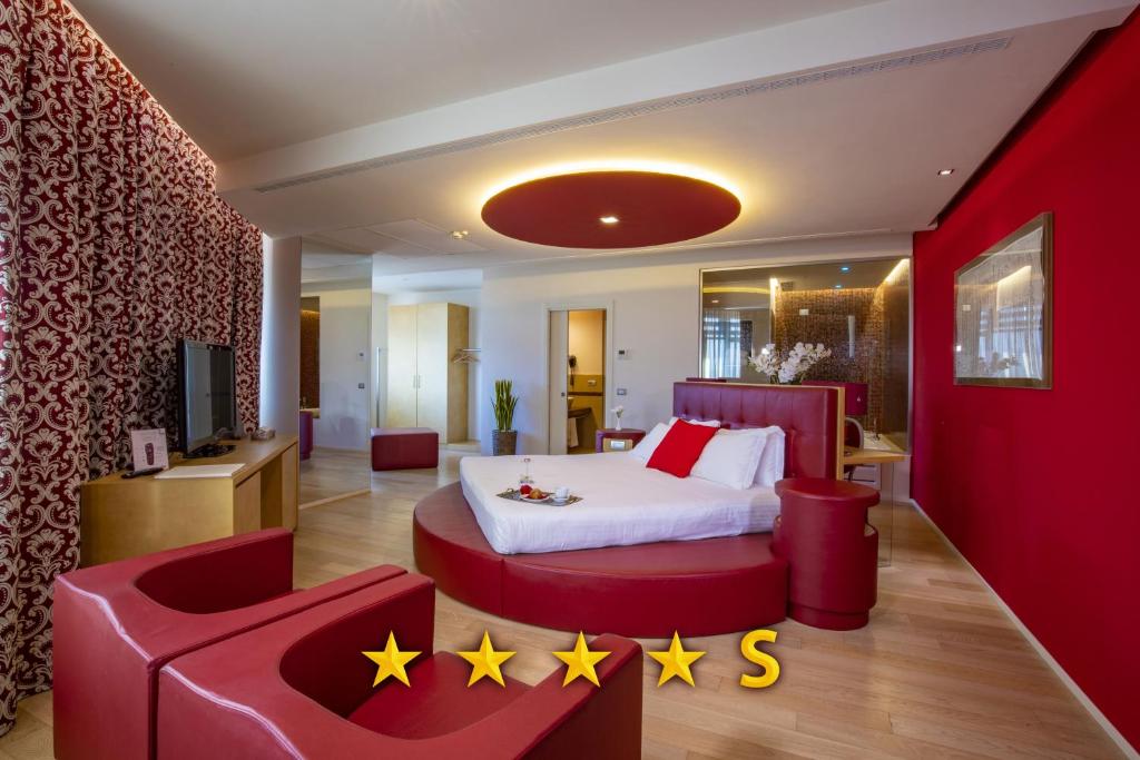 TV a/nebo společenská místnost v ubytování Hotel Glamour
