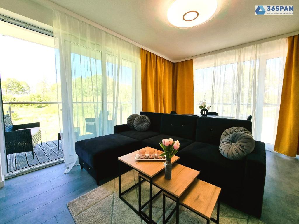 Posedenie v ubytovaní Apartamenty Na Fali w Gąskach - 365PAM