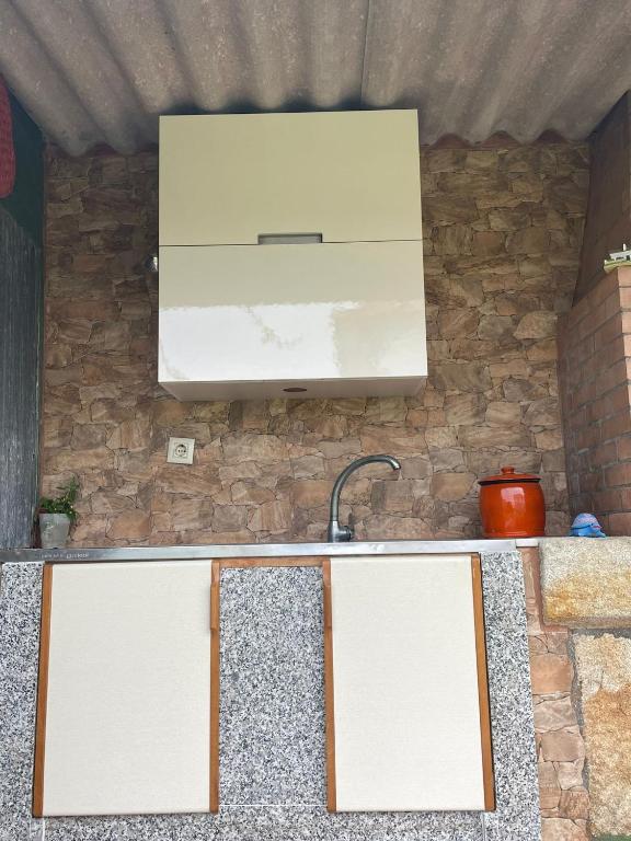 Kuchyňa alebo kuchynka v ubytovaní Pensión Residencia Casa Teresa