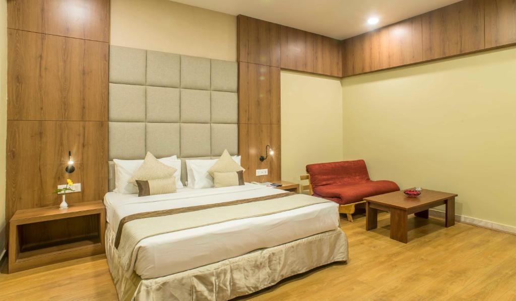 Postel nebo postele na pokoji v ubytování The Citi Residenci Hotel - Durgapur