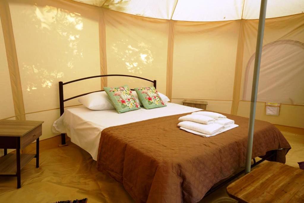 Postel nebo postele na pokoji v ubytování Paliouri Luxury Bungalows