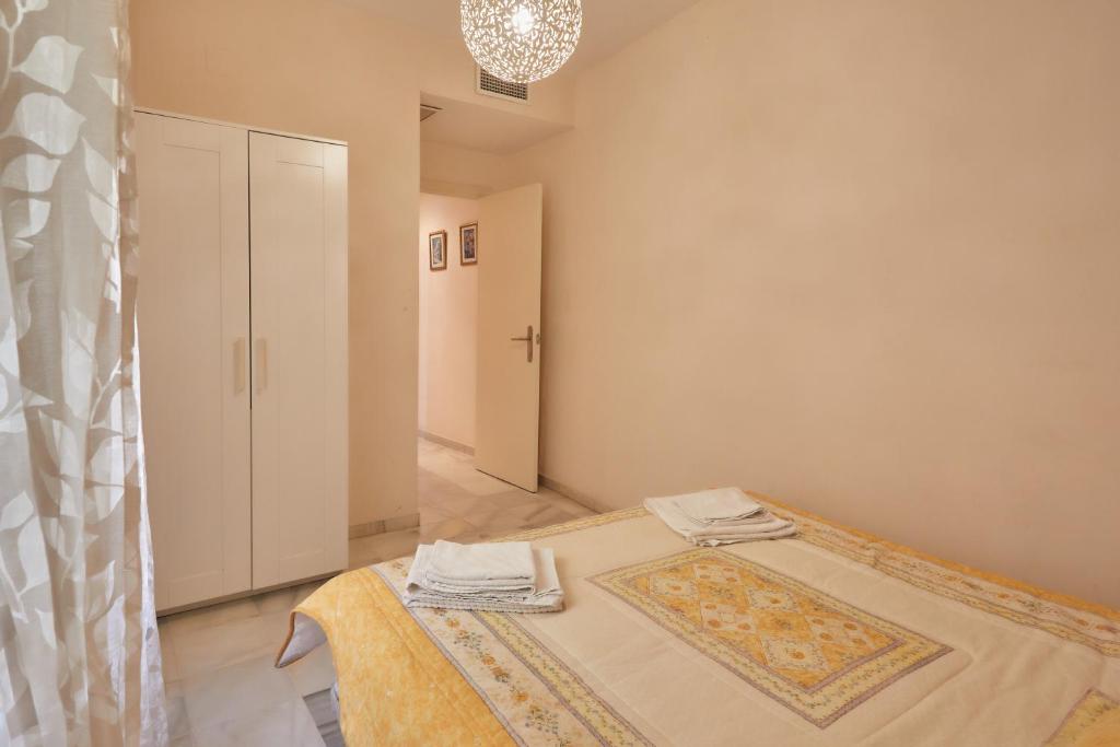 Posteľ alebo postele v izbe v ubytovaní TWO BEDROOMS Leonor Dávalos