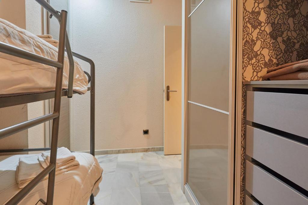 Posteľ alebo postele v izbe v ubytovaní TWO BEDROOMS Leonor Dávalos