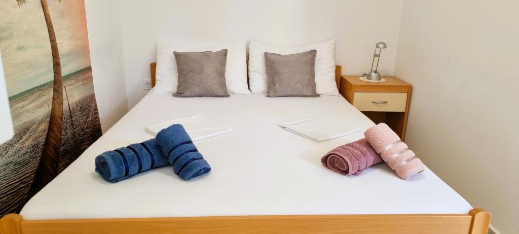 Postel nebo postele na pokoji v ubytování Apartment Tonci