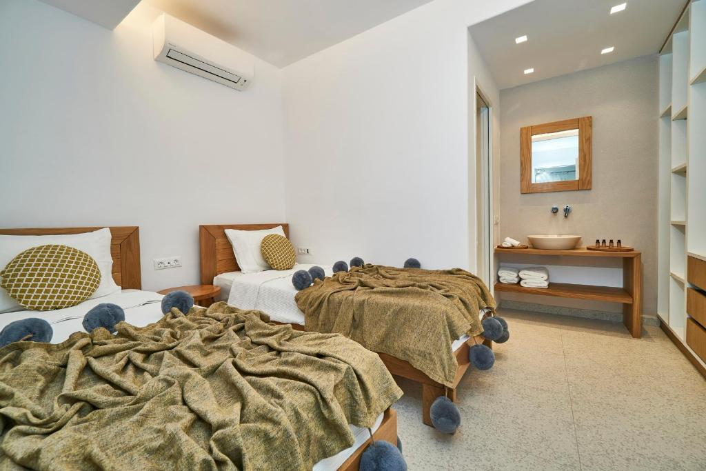 Posteľ alebo postele v izbe v ubytovaní Due Mari Mykonos