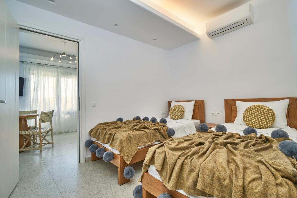 Posteľ alebo postele v izbe v ubytovaní Due Mari Mykonos