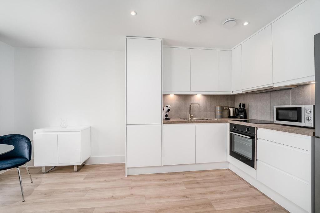 Kuchyň nebo kuchyňský kout v ubytování Citystay - Finch House