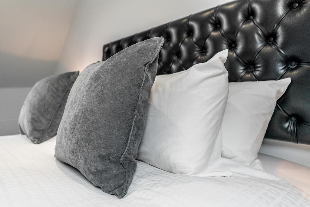 Postel nebo postele na pokoji v ubytování Citystay - Finch House