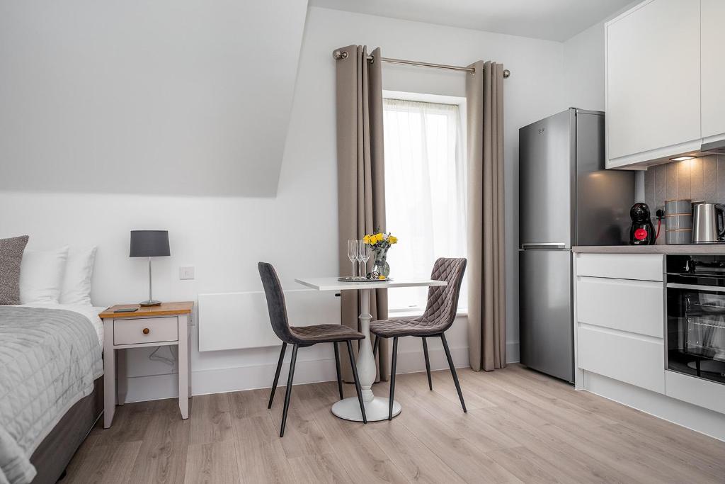Kuchyň nebo kuchyňský kout v ubytování Citystay - Finch House