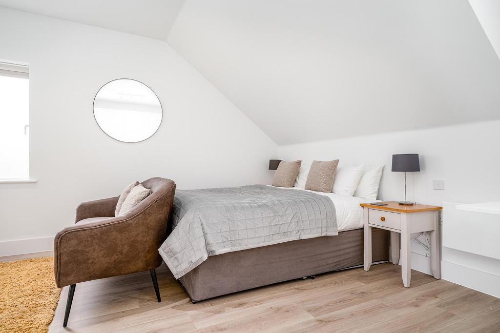 Postel nebo postele na pokoji v ubytování Citystay - Finch House