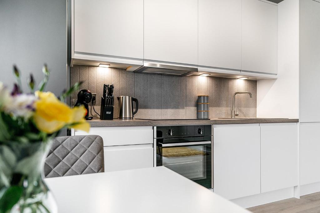 Kuchyň nebo kuchyňský kout v ubytování Citystay - Finch House