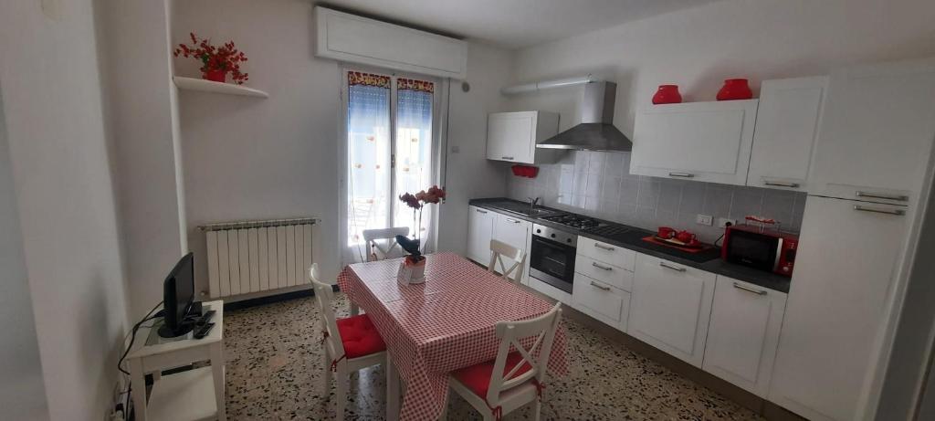 Kuchyň nebo kuchyňský kout v ubytování Hotel Dora