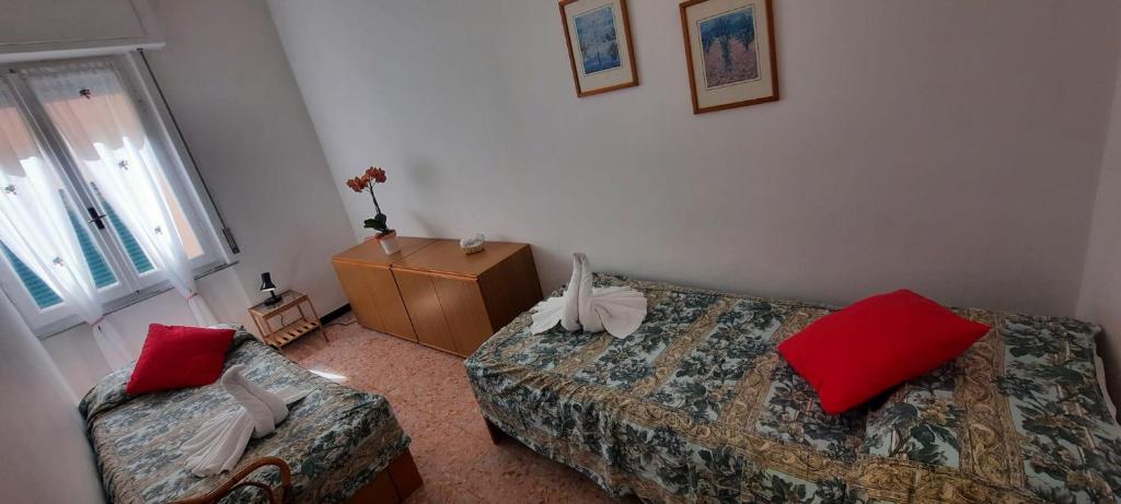 Postel nebo postele na pokoji v ubytování Hotel Dora