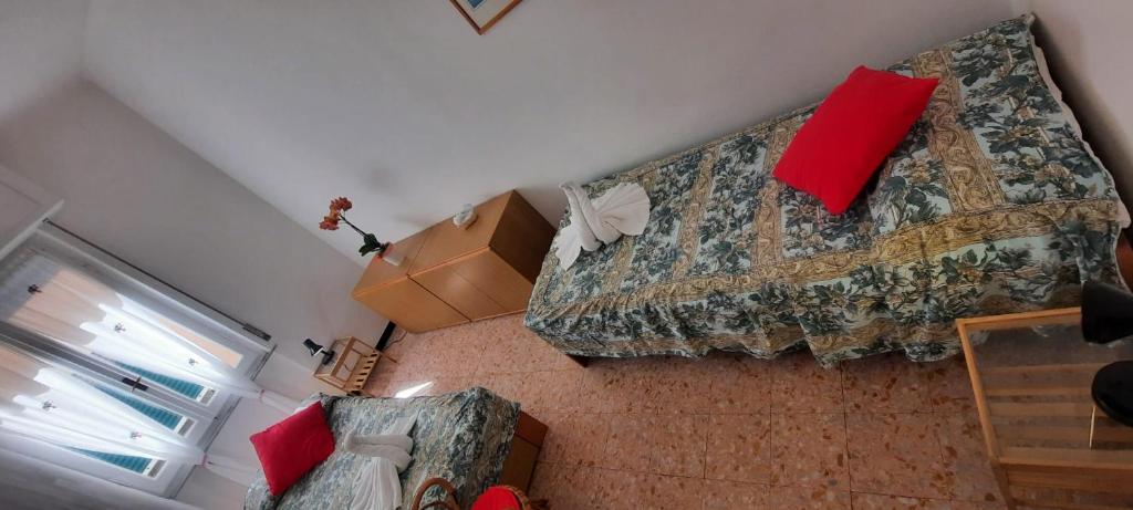 Postel nebo postele na pokoji v ubytování Hotel Dora