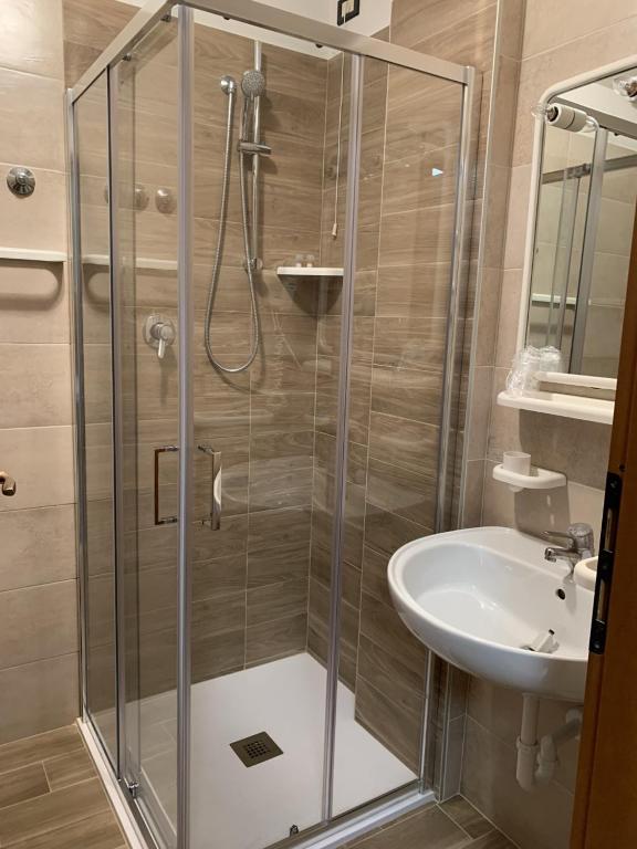 Koupelna v ubytování Hotel Al Capitano
