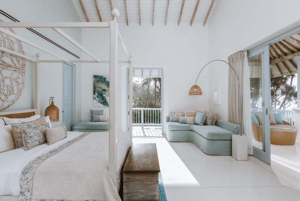 Postel nebo postele na pokoji v ubytování Selenya Talpe - Boutique Villa