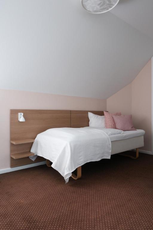 Postel nebo postele na pokoji v ubytování Savoy Hotel