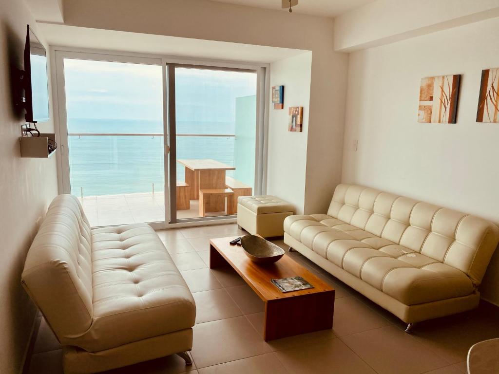 Posezení v ubytování Resort Playa Azul Departamentos