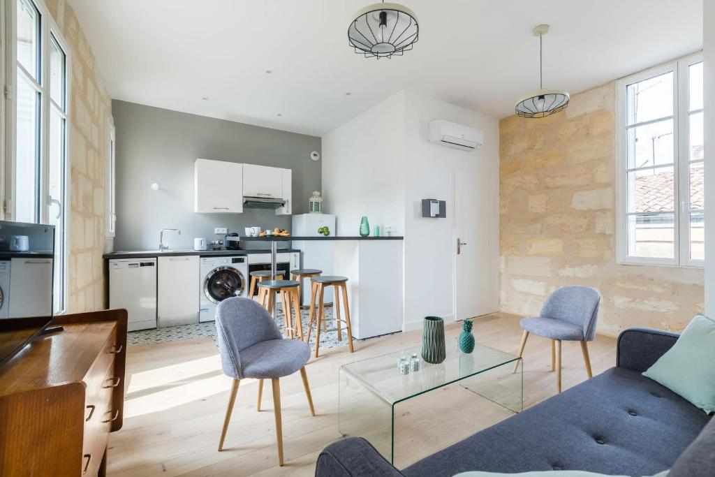 En sittgrupp på GuestReady - Calm and Modern Superb Apartment