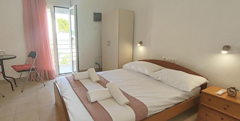 Postel nebo postele na pokoji v ubytování Platia Studios