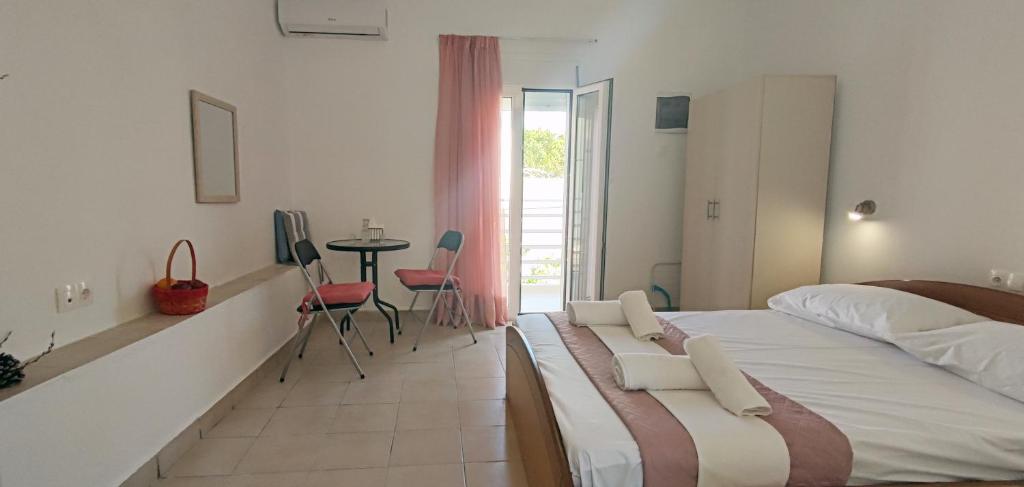 Postel nebo postele na pokoji v ubytování Platia Studios
