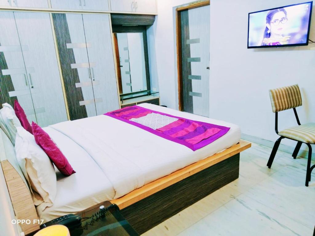Postel nebo postele na pokoji v ubytování Homestayinn