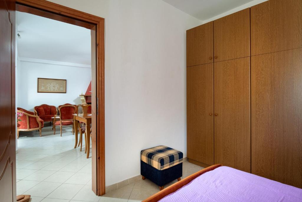 Postel nebo postele na pokoji v ubytování Thodoros apartment