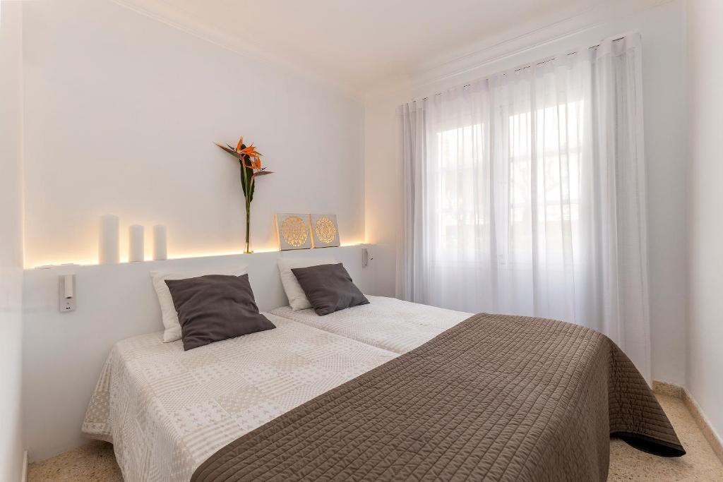 Postel nebo postele na pokoji v ubytování Apartment Carabela I
