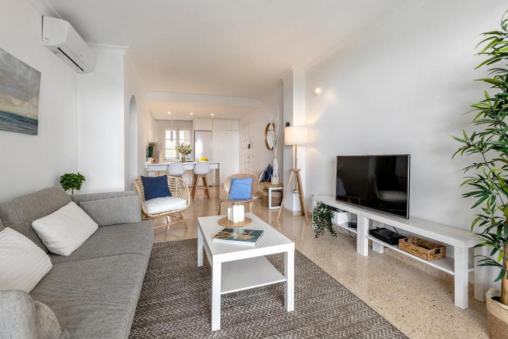 TV a/nebo společenská místnost v ubytování Apartment Carabela I