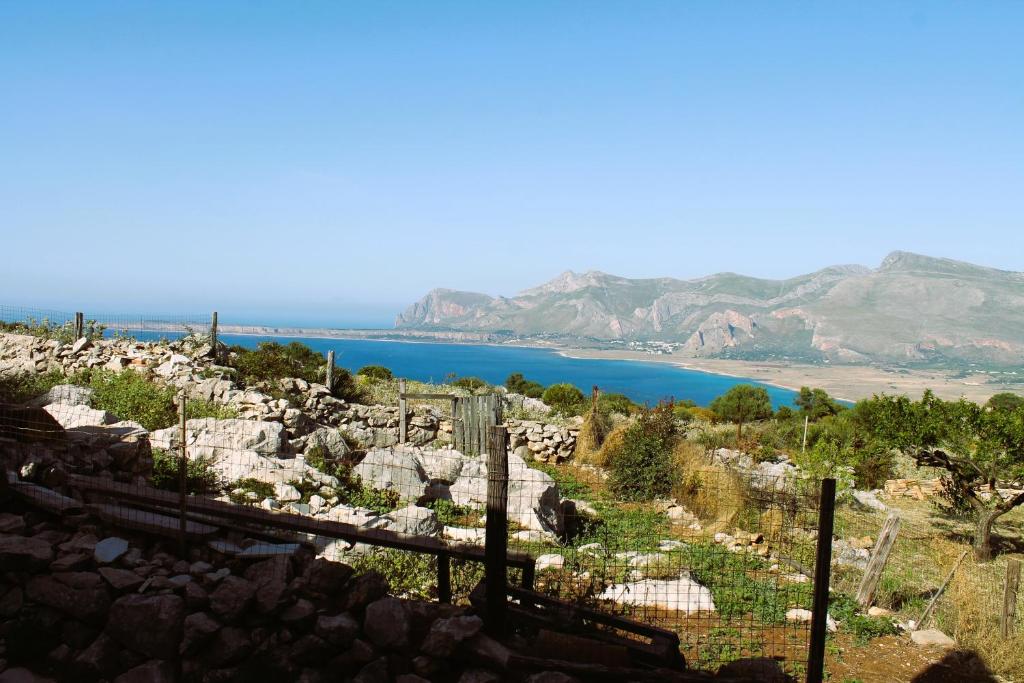 a view of the ocean from the top of a hill at Ai piedi di Cofano in Custonaci