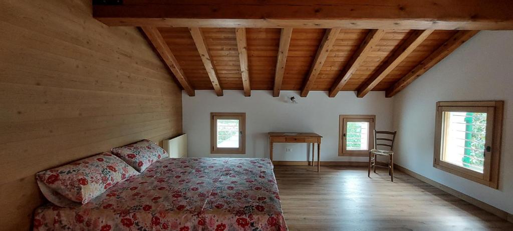 Łóżko lub łóżka w pokoju w obiekcie Agriturismo l'Eremo