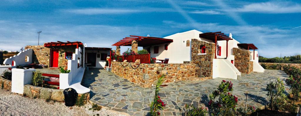 a rendering of a house with a stone walkway at Myconian Brothers in Ano Mera