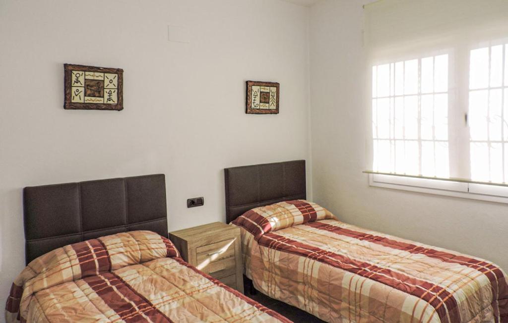 Postel nebo postele na pokoji v ubytování Villa Pratdip