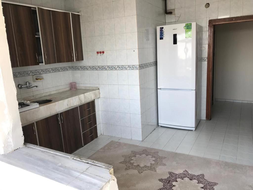 Kuchyň nebo kuchyňský kout v ubytování Mardy Deluxe Houses