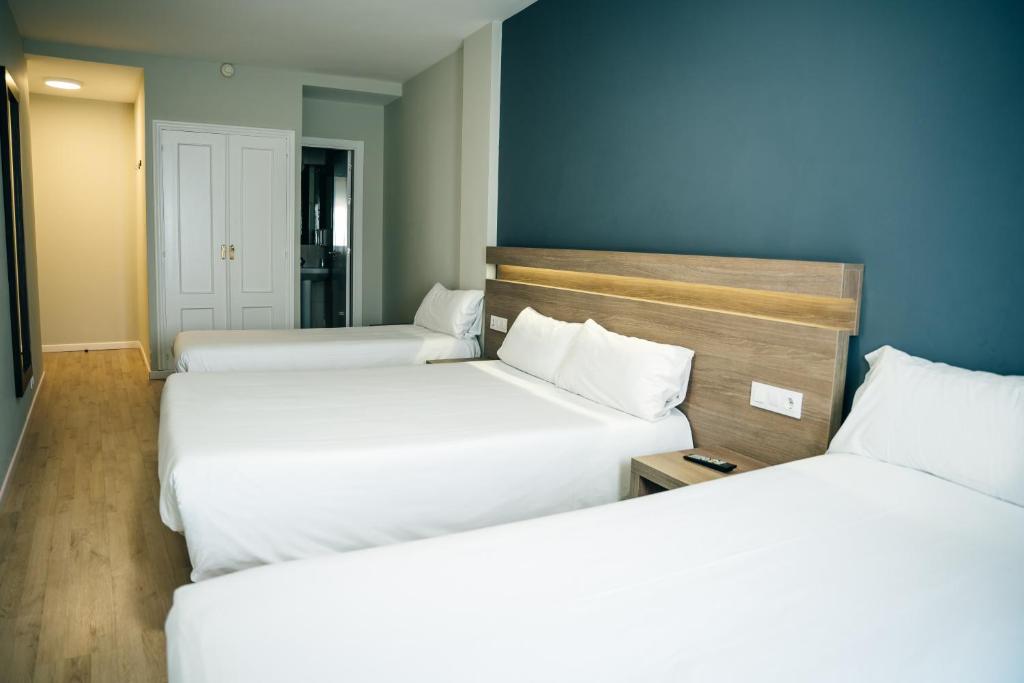 Cama o camas de una habitación en Hotel Alda Estación Pontevedra