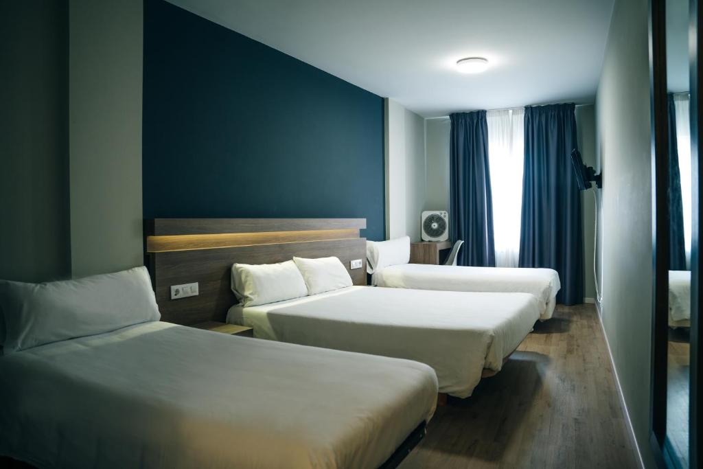 Cama o camas de una habitación en Hotel Alda Estación Pontevedra