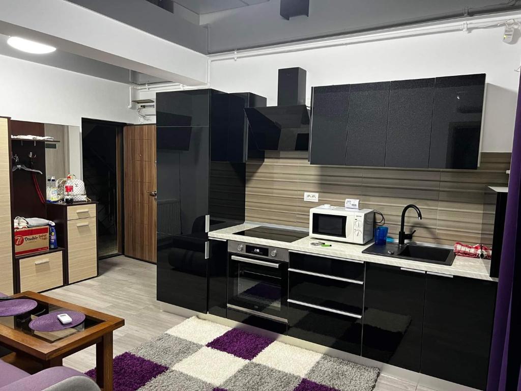Küche/Küchenzeile in der Unterkunft Roxy apartament