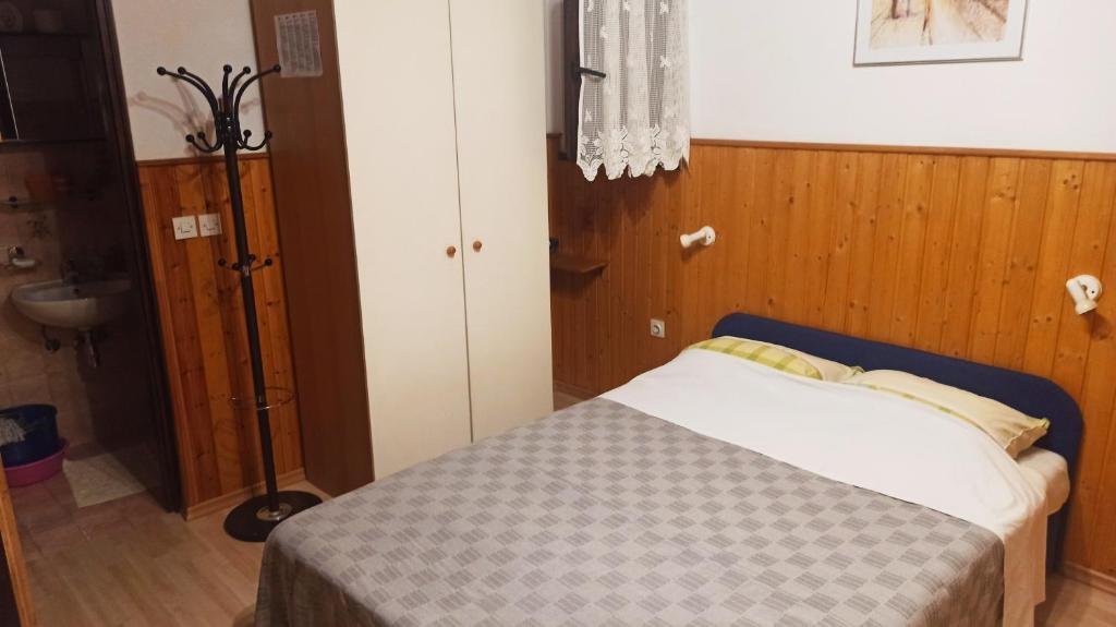 Postel nebo postele na pokoji v ubytování App Sabolic