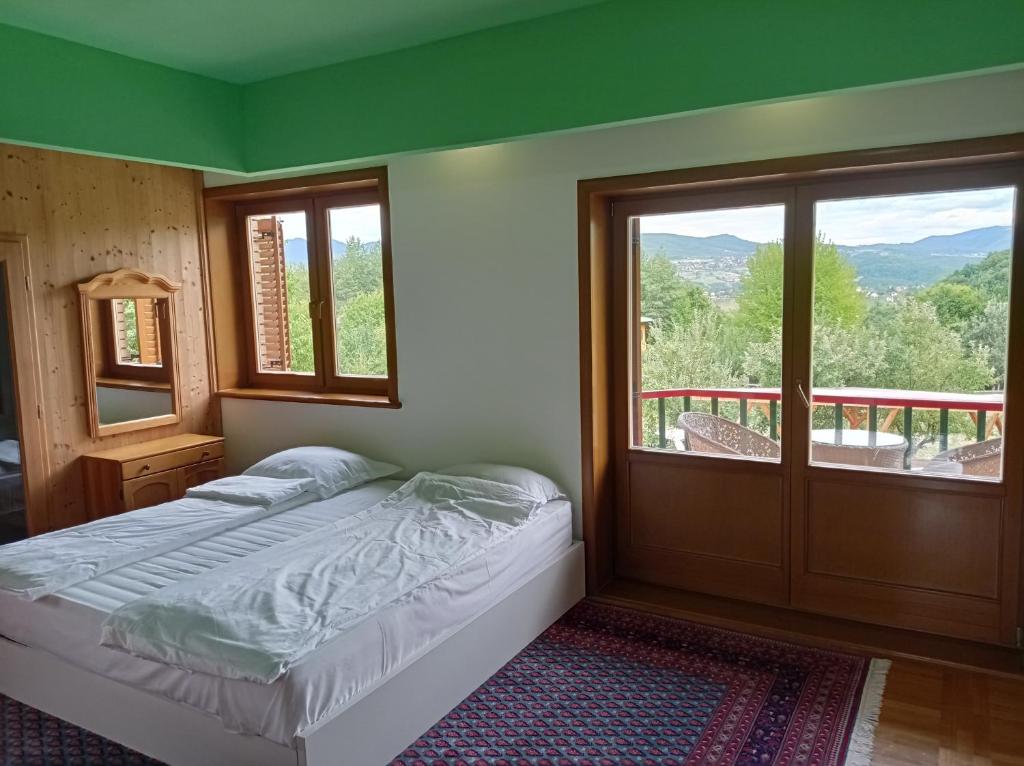 Giường trong phòng chung tại Malak Farma