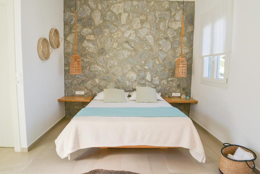 A bed or beds in a room at Hawk Stone