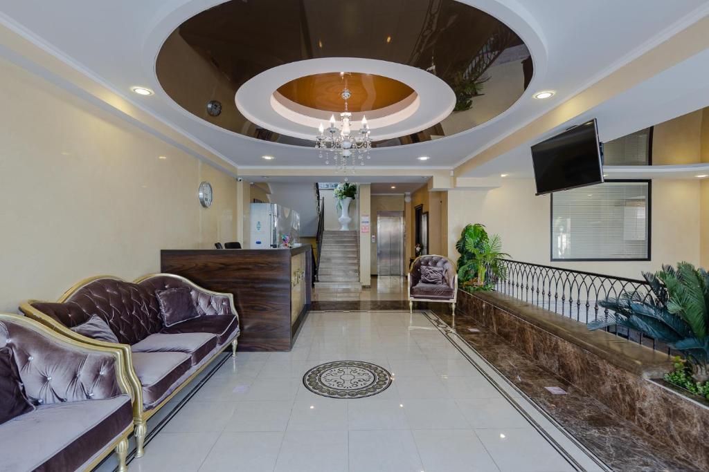 TV a/nebo společenská místnost v ubytování GNS Hotel