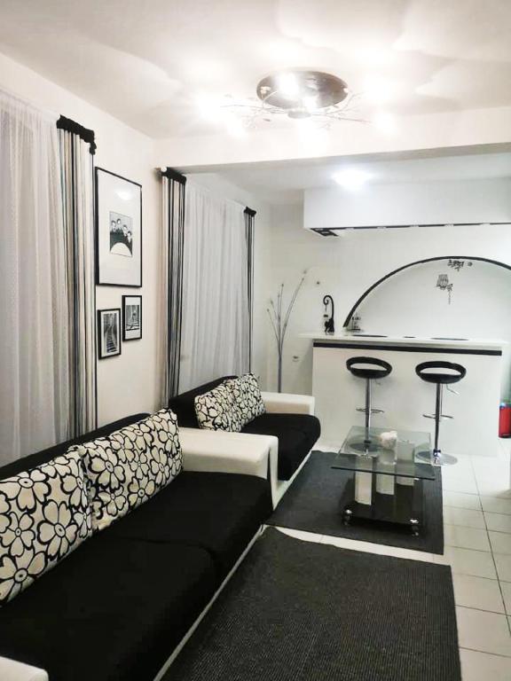a living room with a couch and a table at Apartment Decumana in Krk