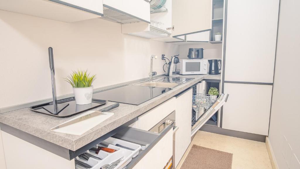 Kuchyňa alebo kuchynka v ubytovaní Relais du Lac Loft - Italian Homing