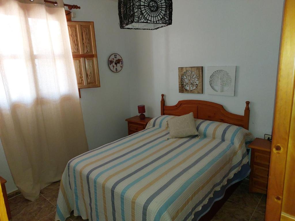 Posteľ alebo postele v izbe v ubytovaní Apartamento Rey Melchor