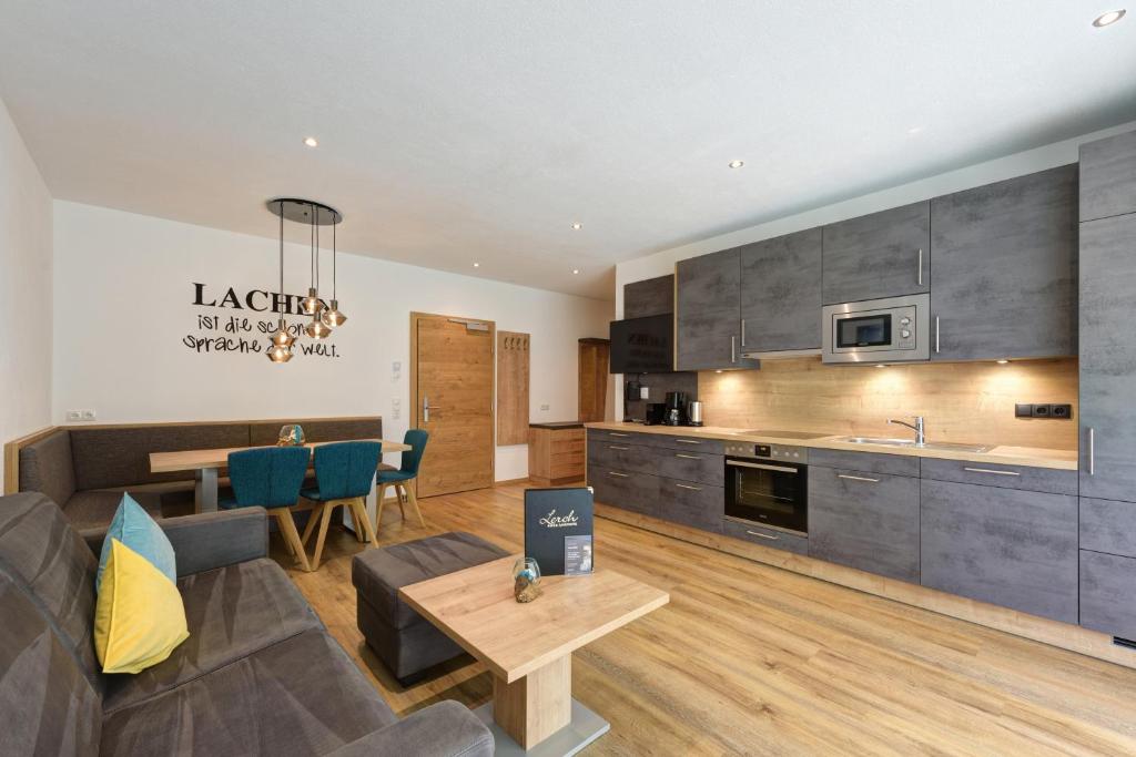 Kuchyň nebo kuchyňský kout v ubytování Aparthotel Lerch