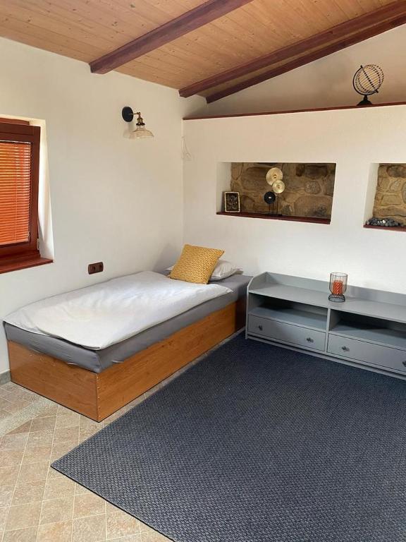 Postel nebo postele na pokoji v ubytování Vila Lucia - Apartmán 6