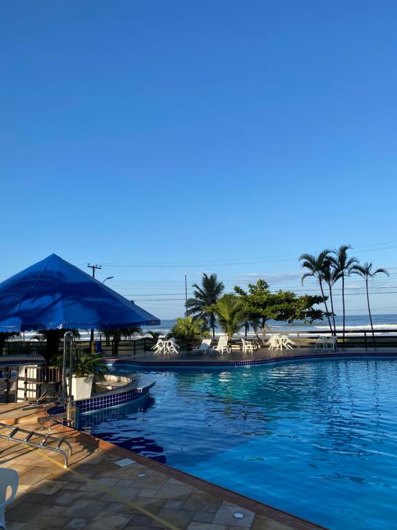 Bazén v ubytování Condomínio Resort Ilhas do Caribe nebo v jeho okolí