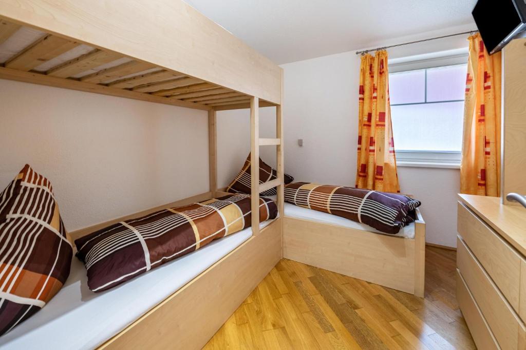 Postel nebo postele na pokoji v ubytování Haus Rudi