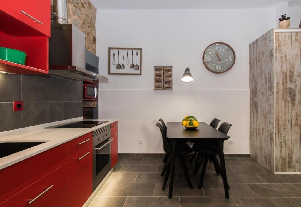 Kuchyň nebo kuchyňský kout v ubytování Petit Loft